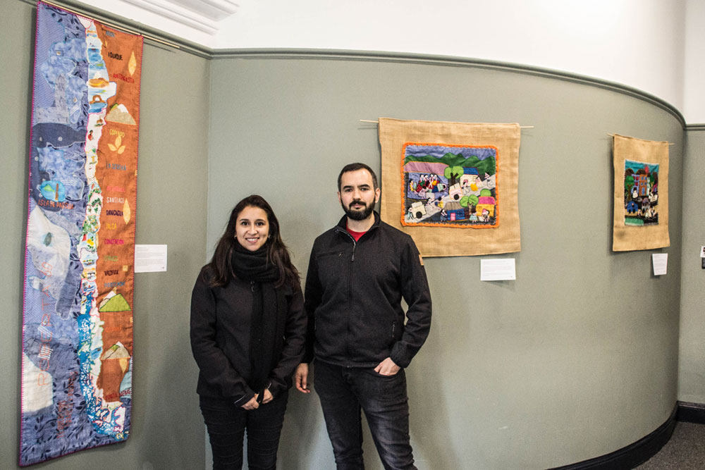 Serguey Maximov, President Edinburgh Chilean Society and Rosa Santibáñez pictured at the exhibition of arpilleras as part of the 