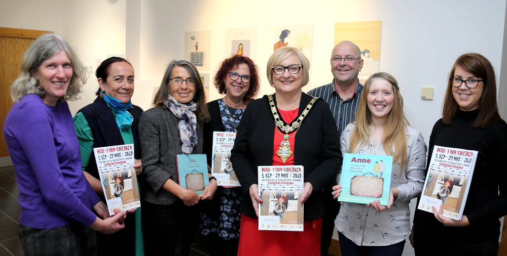 The exhibition team and attendees pictured with Mayor of Causeway Coast and Glens, Councillor Brenda Chivers, at the exhibition opening, 5th September 2018. (Kevin McAuley, McAuley Multimedia)