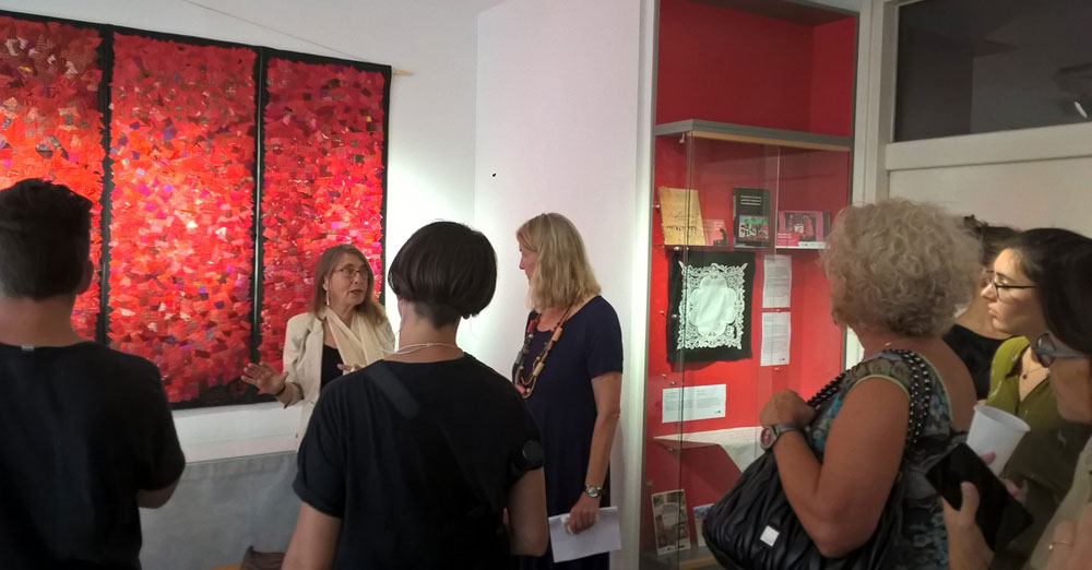 Curator Roberta Bacic with (to her right) Vesna Teršelič, director of Documenta - Centre for Dealing with the Past, during a guided tour at the exhibition launch, 14th September 2019. (Photo: Tajana Ban Kirigin)