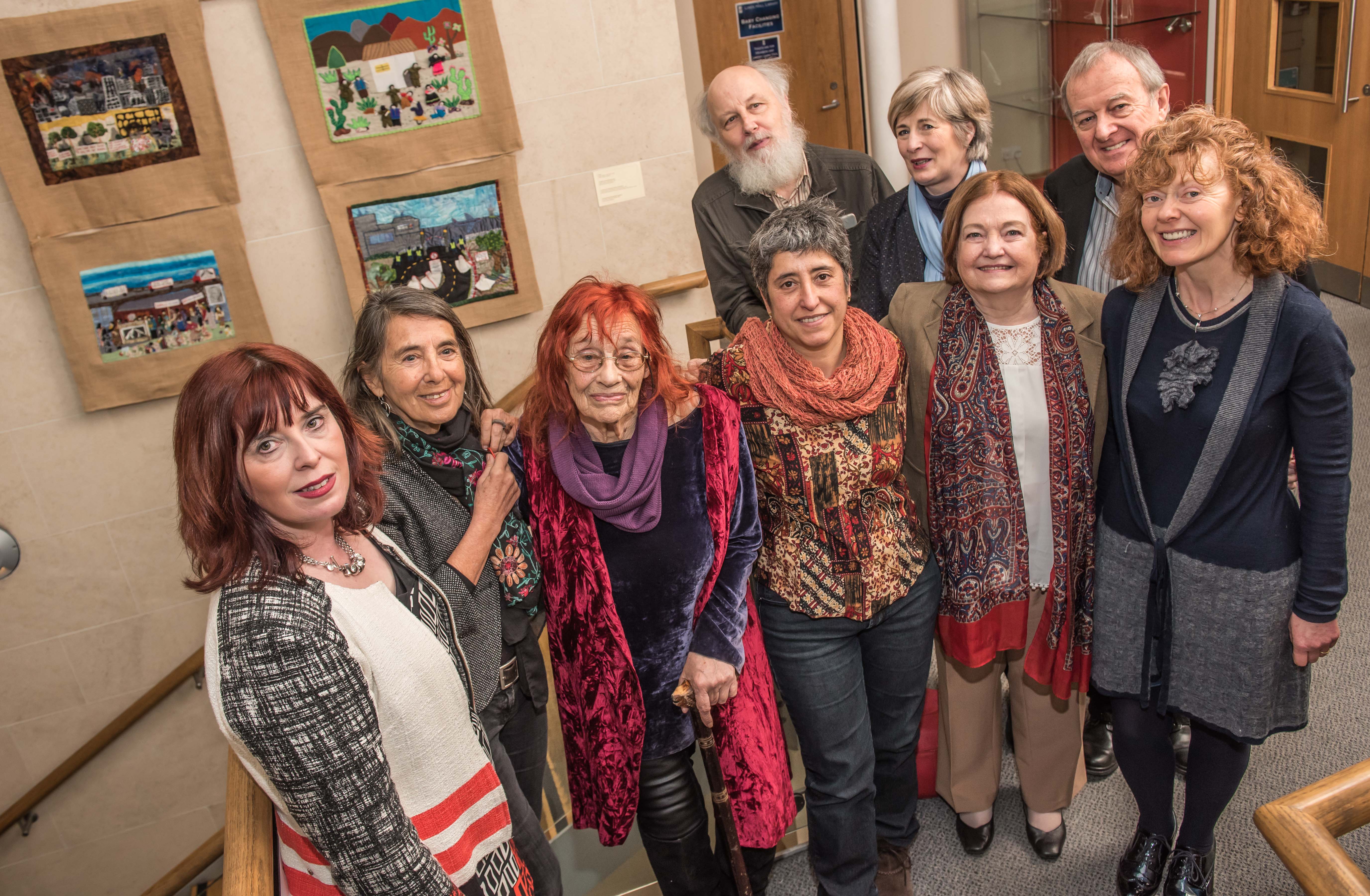 The exhibition team with Margaretta D’Arcy, Peace Activist (3rd from left); Maired Maguire, Nobel Peace Laureate (2nd from right); and Phil Scraton, Emeritus Professor of Criminology, QUB (back row, right), at the launch. (Photo: Linenhall Library)