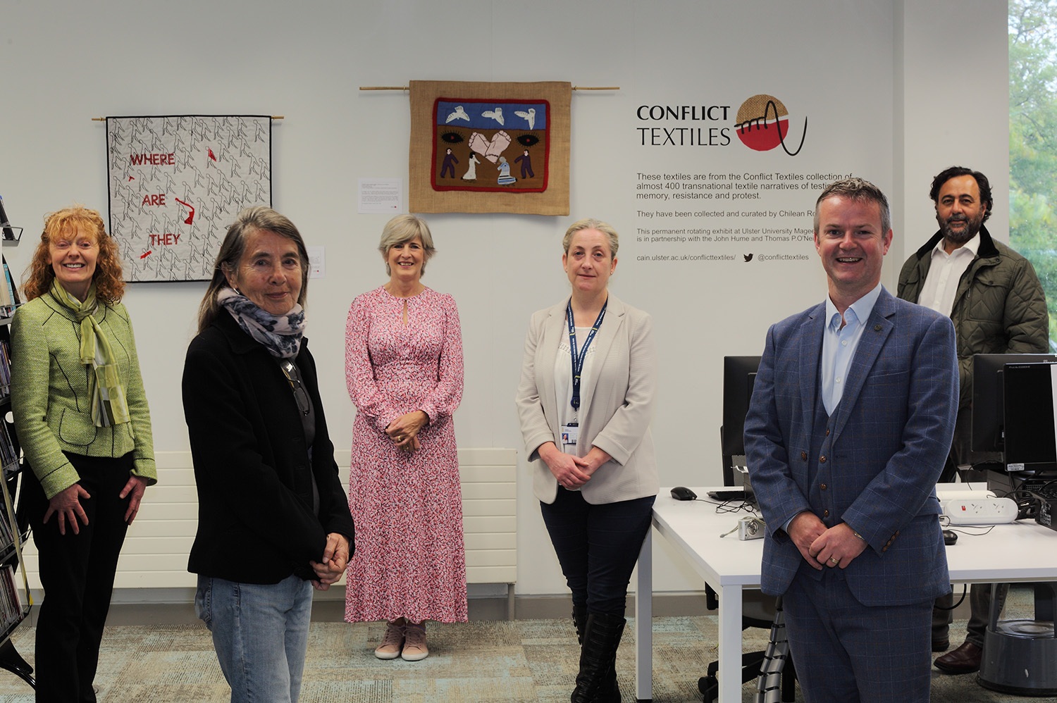 The Conflict Textiles team with Ulster University colleagues  at the opening of the Conflict Textiles permanent rotating exhibition at Magee Campus Library.  (Photo: Martin Melaugh)