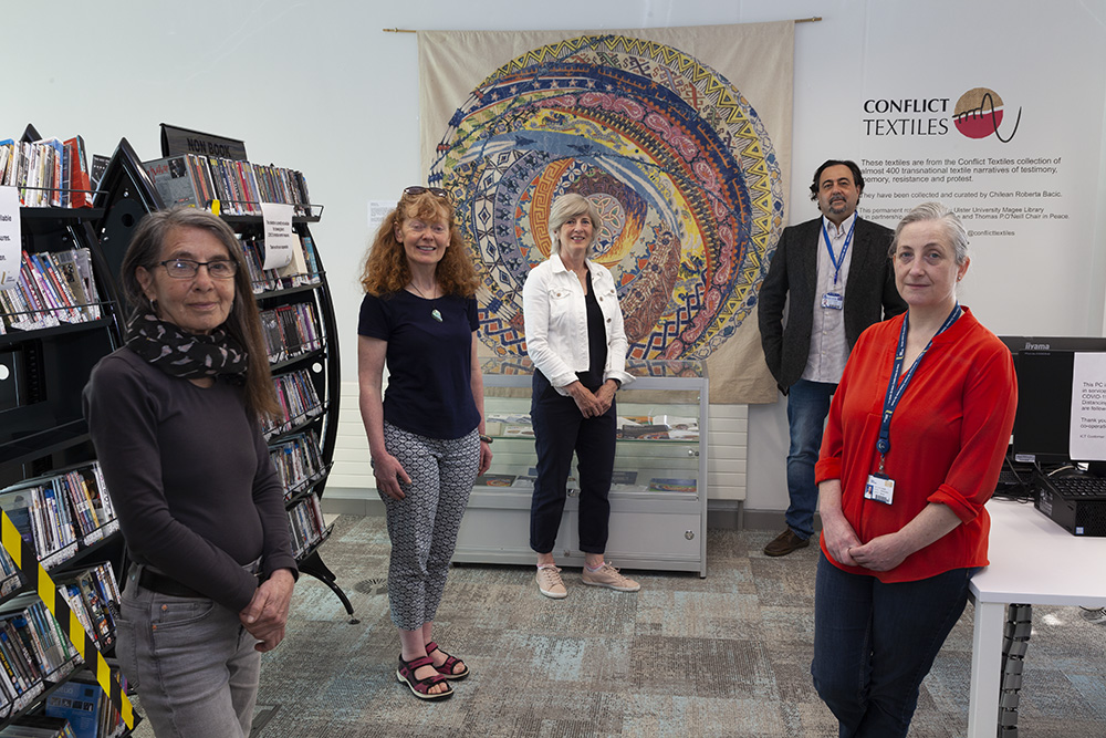 The Conflict Textiles team with Ulster University colleagues at the installation of the 