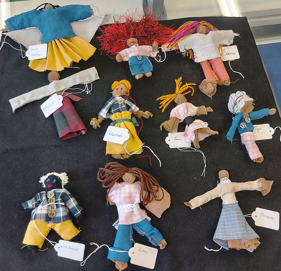 Dolls created from shirt factory scraps in the two hour workshop in the Fashion & Textile Design Centre, Derry / Londonderry.  Each doll bears a name tag and represents a person connected to the shirt factories. (Photo: Kyra Reynolds)