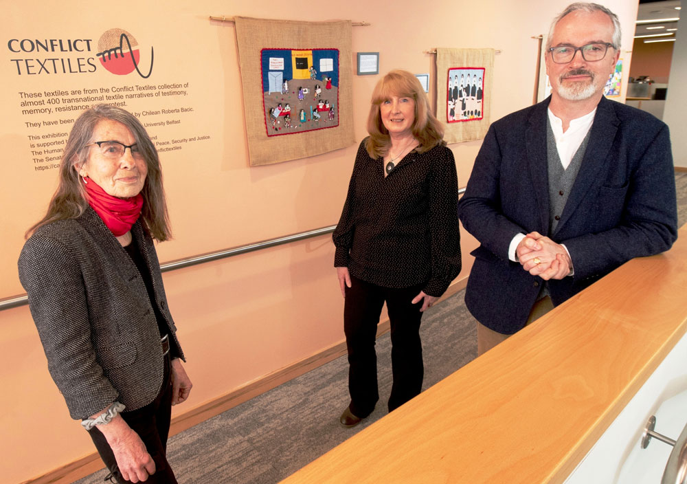 Roberta Bacic (Conflict Textiles), Christine Carrothers (QUB Library) & Prof Richard English (Senator George J. Mitchell Institute for Global Peace, Security and Justice), at the recent Conflict Textiles exhibition launch.  (Photo: © QUB)
