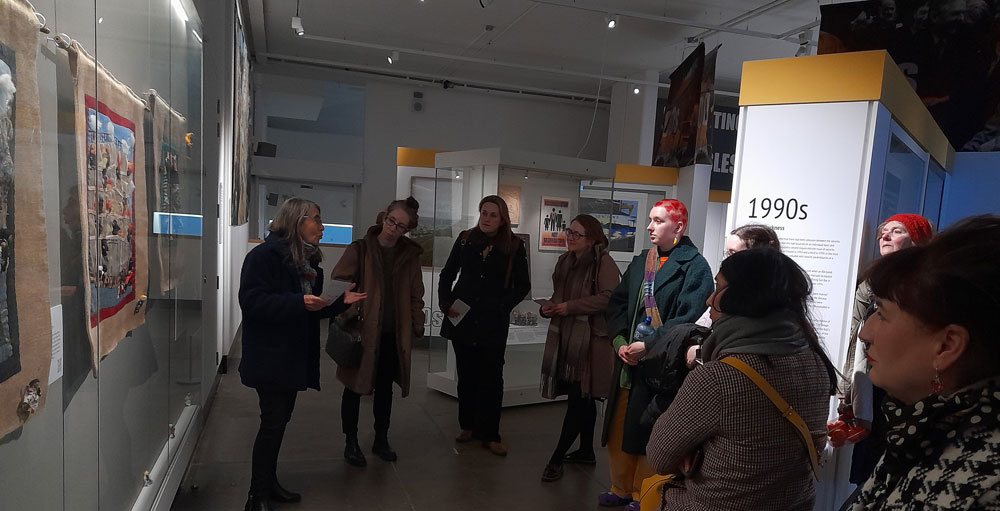 Conflict Textiles curator Roberta Bacic giving an insight into the four pieces on display at the opening of 'Mujeres Disruptivas' exhibition in the Ulster Museum, 8 February, 2023. (Photo: Breege Doherty)