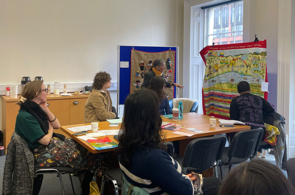 Conflict Textiles curator Roberta Bacic giving an insight into some textiles from Colombia, (which are part of the Conflict Textiles collection) at the workshop: 