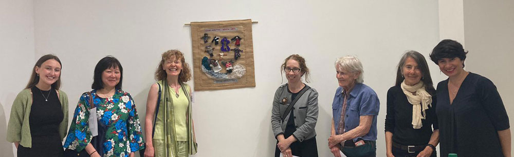 Representatives from Conflict Textiles, Void gallery, Tower Museum and arpillera workhop attendees pictured at the unveiling of 'Mujeres Disruptivas collective arpillera', on UN World Refugee Day 2023.  (Photo: CRH)