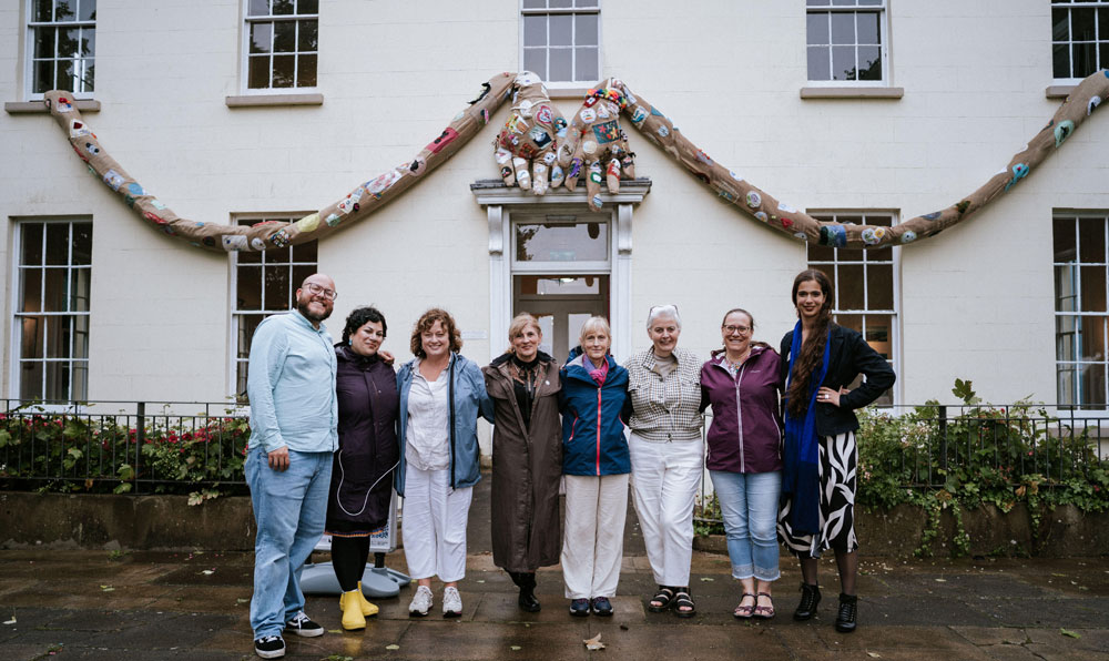 The 'Woven Hug' team pictured at the launch of the 'Woven Hug' participatory textile installation at Flowerfield Arts Centre, Portstewart, 6th July 2023.  (Photo: Woven Hug project) 